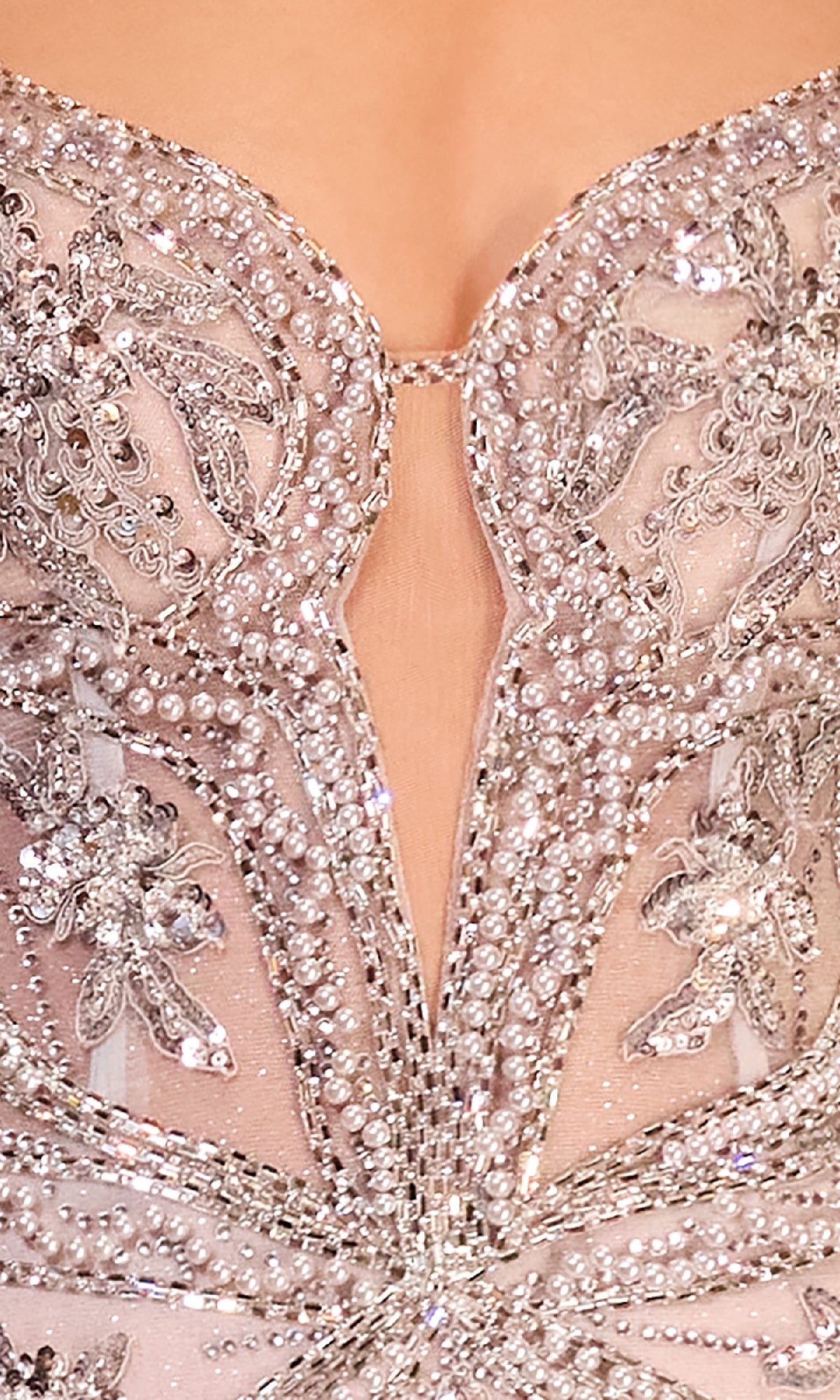 Close-up of the intricately beaded and sequined neckline on the Ladivine CC0240 Long Beaded Silver Prom Dress, showcasing shimmering embellishments and detailed patterns.